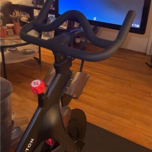 Peloton Black Fitness Bike with Red Accents